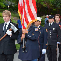 <p>Armonk firefighters march in the Katonah parade.</p>