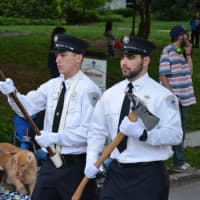 <p>Chappaqua firefighters march in the Katonah parade.</p>