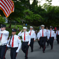 <p>Vista firefighters march in the Katonah parade.</p>