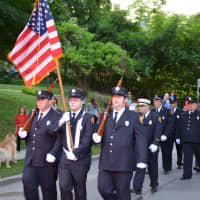<p>Carmel firefighters march in the Katonah parade.</p>