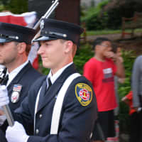 <p>New Canaan firefighters march in the Katonah parade.</p>