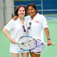 <p>Maya Todrin, left, with her tennis partner Kyra Fitzpatrick. Todrin is participating in the Special Olympic Summer Games this weekend.</p>