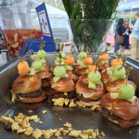 <p>The pretzel burger at Westchester Burger Company was served with a side of peach sangria.</p>