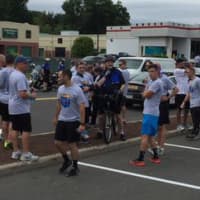 <p>Greenwich Police Department runners</p>