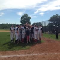 <p>The Mamaroneck varsity baseball team celebrates its 5-0 win on Saturday in the State regional final over Horseheads.</p>