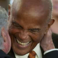 <p>Regis Philbin greets honoree Harry Belafonte at the Changemaker Gala at the Greenwich Film Festival.</p>