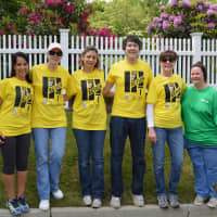<p>The corporate volunteers -- from Duracell and Praxair -- are taking part in the United Way of Western Connecticuts Annual Day of Action.</p>