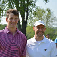 <p>Eli Manning poses for photos with Thomas Panek, CEO of Guiding Eyes For The Blind.</p>