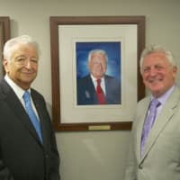 <p>Norwalk Mayor Harry Rilling (right) and former Mayor Richard A. Moccia in front of Moccia&#x27;s official portrait.</p>