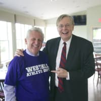 <p>Stamford Mayor David Martin is thrilled to see Norwalk Mayor Harry Rilling wearing the Westhill colors.</p>