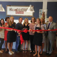 <p>The owners and staff of Chocolate Works celebrate the opening with members of the Darien Chamber of Commerce.</p>