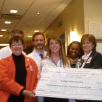 <p>Hudson Valley Hospital&#x27;s Anne Campbell Maxwell, Dr. Pond Kelemen, Kathy Kiernan, Dr. Chika Madu, Debbie Neuendorf and Kathy Webster join State Sen. Greg Ball Thursday as he presented the hospital with a grant for $150,000.  </p>