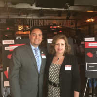 <p>Carlos Reinoso and Kim Killoy of the Human Services Council at Johnny Utah&#x27;s for the start of the seventh annual SoNo Stroll.</p>