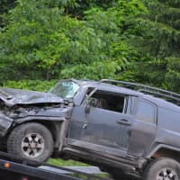 <p>A damaged vehicle involved in a collision at the intersection of Routes 22 and 35 in Katonah.</p>
