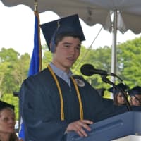 <p>Salutatorian Henry Tracey speaks to the crowd at Friday&#x27;s ceremony.</p>