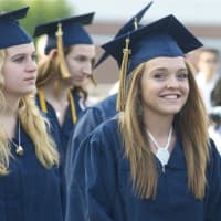 <p>Weston High seniors head for their commencement ceremonies Friday afternoon.</p>
