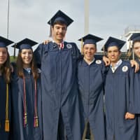 <p>Weston High School students celebrate at commencement ceremonies Friday afternoon.</p>