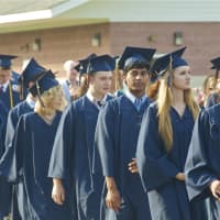 <p>Weston High seniors head for their commencement ceremonies Friday afternoon.</p>