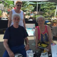 <p>Dory Traski, Steve Traski and Pat Hegnauer of the G&amp;B Cultural Center in Georgetown operate a silent auction.</p>