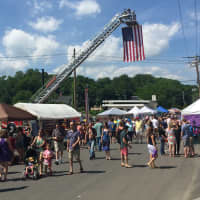 <p>Crowds fill Main Street to sample local food and other vendors for Georgetown Day.</p>