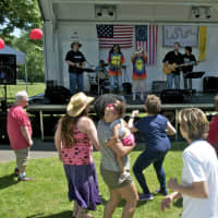 <p>Visitors dance to live music at Sunday&#x27;s Ice Cream Social.</p>