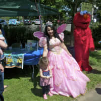 <p>A Princess and Elmo are on hand for photos with the kids.</p>