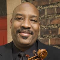 <p>Ashley Horne leads the Harlem Chamber Players on Aug. 5.</p>
