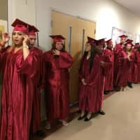 <p>The graduates of Briggs High School in Norwalk lineup for commencement exercises. </p>