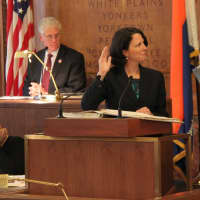 <p>Westchester County Executive Deputy County Clerk Eileen Songer McCarthy swears in Alan Cole. </p>