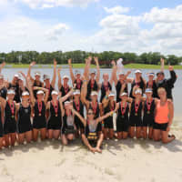 <p>The whole group of rowers from Saugatuck celebrates. </p>