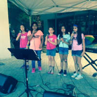<p>Students from the rock star vocal workshop perform at Ossining VillageFair. The girls -- Caleigh, Christina, Eden, Ella and Ariana, who come from Ossining, Briarcliff and Chappaqua -- sang two songs. They have been working on pop/rock voc</p>