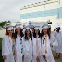 <p>Members of the Class of 2015 from Joel Barlow High School celebrate at their graduation ceremony Wednesday at Western Connecticut State University in Danbury.</p>