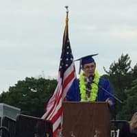 <p>Class President Matthew Peters takes to the podium at the graduation. </p>