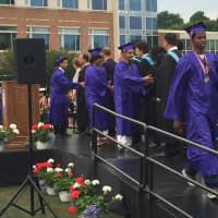<p>Brien McMahon seniors leave high school behind after graduating Wednesday.</p>