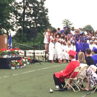 <p>Senior Class Housemaster Scott Hurwitz offers students words of advice and encouragement during his remarks at the graduation ceremony.</p>