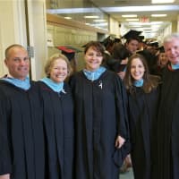 <p>Faculty members pose with new Headmaster David Ebling (right).</p>