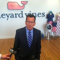 <p>Gov. Dannel P. Malloy speaking after a tour of the new Vineyard Vines headquarters in Stamford Thursday.</p>