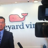 <p>Gov. Dannel P. Malloy speaks during a tour of the new Vineyard Vines headquarters in Stamford on Thursday.</p>