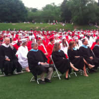 <p>The graduation ceremony begins at Greenwich High School.</p>
