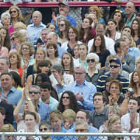 <p>A large crowd fills the stands for the 2015 graduation at New Canaan High School. </p>