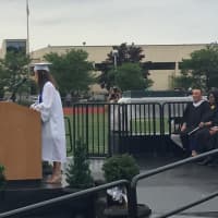 <p>Valedictorian Kasey Hogan offers words of encouragement to her fellow students.</p>