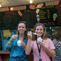 <p>Enjoying a King Kone ice cream cone.</p>