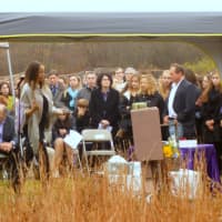 <p>Elizabeth Phaire, far left, burns sage to commemorate Deborah Healy-Seidlitz&#x27;s life during a memorial held Wednesday at Ward Pound Ridge Reservation.</p>