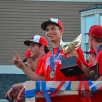 <p>Members of Byram Hills&#x27; championship-winning baseball team at a parade in Armonk.</p>
