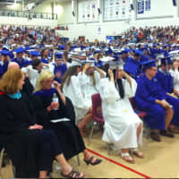 <p>Graduates and special guests wait for the Wilton High School graduation ceremonies to begin.</p>
