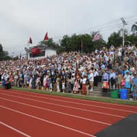 <p>Family and friends of the graduates of Rye&#x27;s class of 2015 are at the field and ready to see thier family member or friend to walk down the aisle to get his or her diploma.</p>