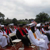 <p>Students anxiously awaited to hear their name called as a member of the class of 2015.</p>