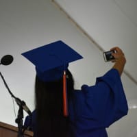 <p>Horace Greeley Co-Valedictorian Riya Verma takes a selfie just before her speech.</p>