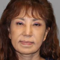 <p>Joo Yoon Kyung, 56, of Flushing, NY was charged with third-degree promoting prostitution. </p>