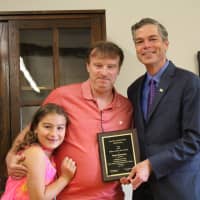 <p>White Plains Mayor Thomas Roach honoring a local dad. </p>